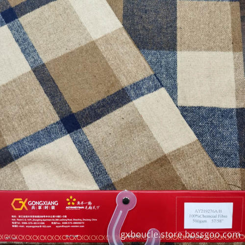 Ull med tyg i tartan med dubbelt ansikte